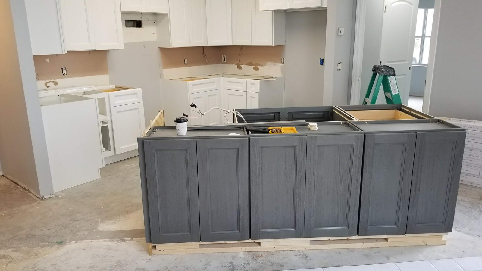 new kitchen cabinets being installed